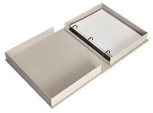 The PrintWorks "A Dog’s Life Photo Album" is an open gray ring binder with a cotton cover and acid-free pages, holding blank white paper, shown on a white background.