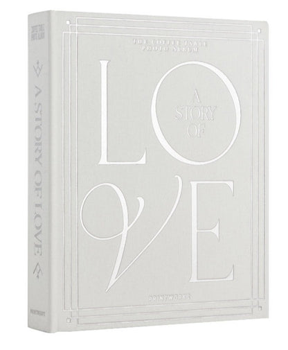 The PrintWorks "A Story of Love Wedding Album" is a hardcover photo album with embossed white text and decorative borders on a light gray cover, ideal for preserving your wedding day memories.