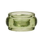 The Provence Napkin Ring Collection by Juliska features a green glass napkin ring with a smooth, rounded design and raised edges, inspired by the charm of Provence. Shown on a white background.
