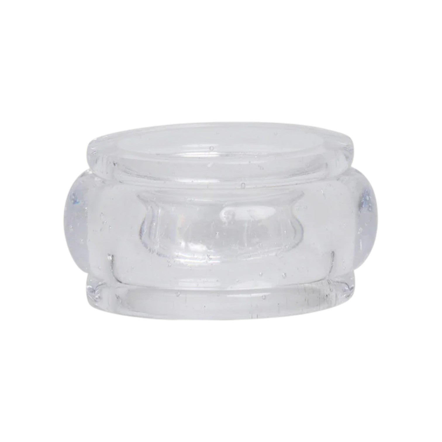 The Provence Napkin Ring Collection by Juliska features clear, cylindrical glass rings with rounded edges and a thicker middle, reminiscent of bubbly Provençal glassware.