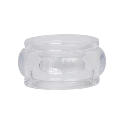 The Provence Napkin Ring Collection by Juliska features clear, cylindrical glass rings with rounded edges and a thicker middle, reminiscent of bubbly Provençal glassware.