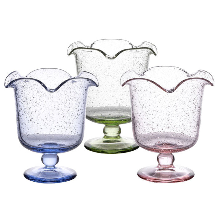 The Juliska Provence Vase by Juliska features mouth-blown glass with a bubble texture and scalloped edge, its elegant design making a whimsical centerpiece against a white background.