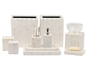 The Proviso White Bath Collection by Pigeon & Poodle includes trays, containers, a tissue box, soap dispenser, toothbrush holder, and soap dish—all in a cohesive geometric design for luxury bathroom decor.