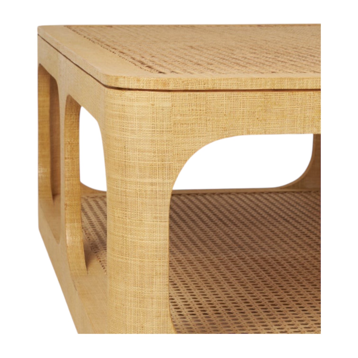 Close-up of the Fiorenza Coffee Table by Made Goods, featuring a rectangular raffia and cane top, woven surface, open sides, lower shelf, and a sturdy square frame.