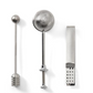 The PrintWorks Tea Tool Set includes a honey dipper, perforated sphere tea infuser, and flat-edged tongs with dotted grip, all crafted from stainless steel and displayed on a white background.