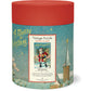 Cylindrical container with red lid labeled "Santa Claus 500 Piece Puzzle" by Cavallini Papers and Co, featuring vintage Santa imagery from the Cavallini archives; includes a festive 500-piece puzzle.