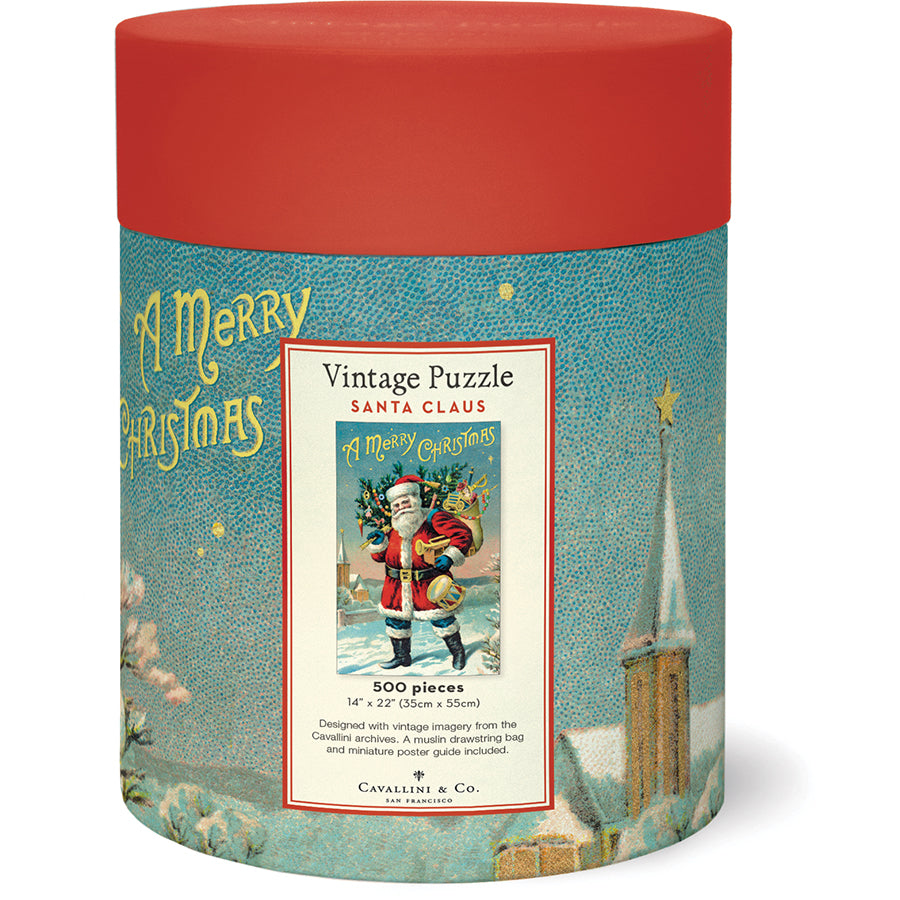 Cylindrical container with red lid labeled "Santa Claus 500 Piece Puzzle" by Cavallini Papers and Co, featuring vintage Santa imagery from the Cavallini archives; includes a festive 500-piece puzzle.