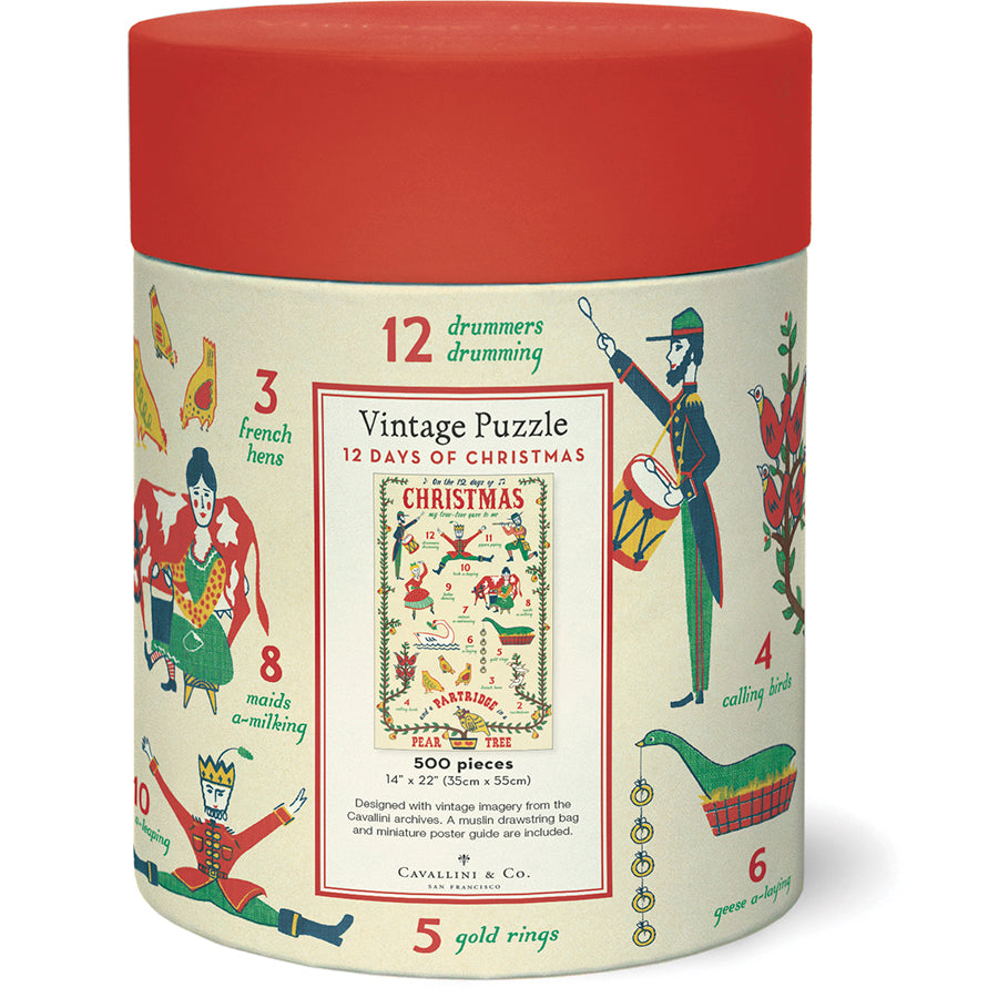 A cylindrical container with a red lid, labeled "Twelve Days of Christmas 500 Piece Puzzle" by Cavallini Papers and Co, features vintage imagery and charming illustrations for each gift from the classic holiday song.