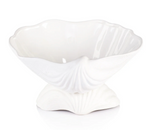 The La Coquille Stoneware Clam Shell Bowl by Zodax boasts a glossy white finish, wide wavy rim, and shell-patterned base—an elegant coastal accent for any room.