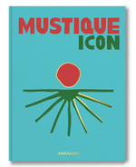 The "Mustique Icon" book by Assouline features a turquoise cover with abstract green and yellow lines and a red circle, evoking Caribbean luxury and the allure of the exclusive private island.