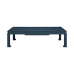 The Wylder Coffee Table by Made Goods is a rectangular blue piece featuring a high gloss linen-textured surface and four straight legs, shown from the front against a white background.