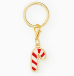 The Foggy Dog Candy Cane Collar Charm features a festive enamel candy cane on a gold keyring with clasp, making it the perfect holiday accessory for your pet’s collar.