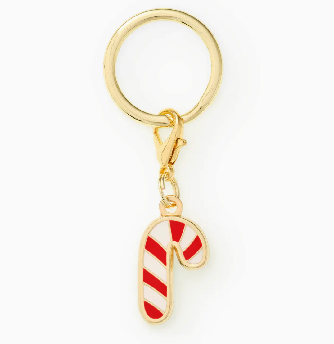 The Foggy Dog Candy Cane Collar Charm features a festive enamel candy cane on a gold keyring with clasp, making it the perfect holiday accessory for your pet’s collar.
