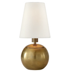 Tiny Terri Round Accent Lamp featuring a compact, spherical brass base and a tapered white shade.