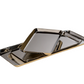 Three Park Lane Versatile Rectangle Trays by Zodax are stacked against a white background, highlighting the modern, decorative appeal of each steel tray.
