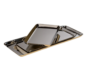 Three Park Lane Versatile Rectangle Trays by Zodax are stacked against a white background, highlighting the modern, decorative appeal of each steel tray.