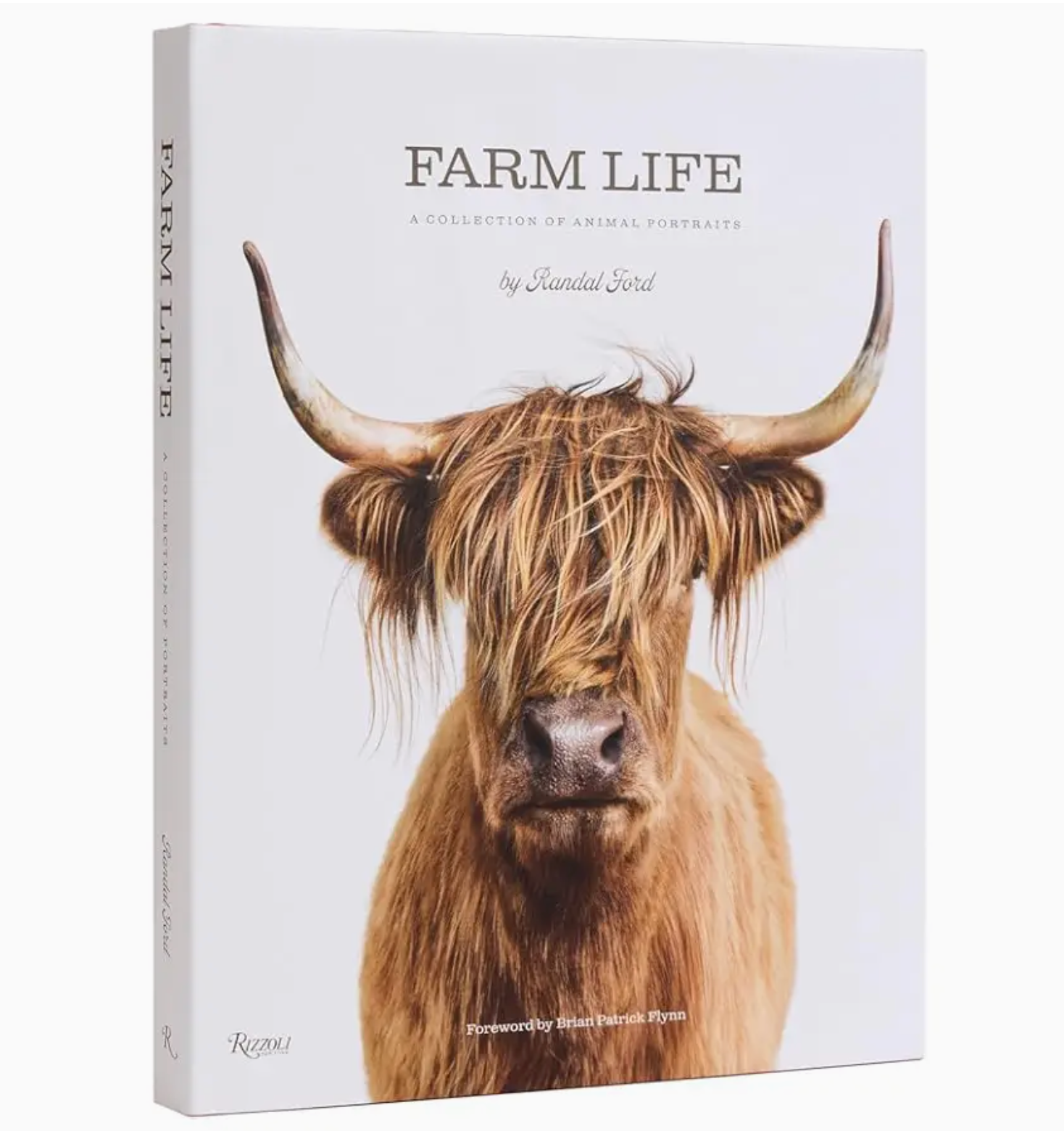 Book titled “Farm Life” by Rizzoli features a striking cover image of a Highland cow with long horns and shaggy hair, capturing stunning animal photography that conveys the true spirit of farm animals.