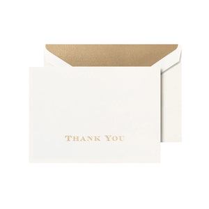 Crane's Gold Thank You Card Set features white all-cotton paper cards with gold metallic engraving and lettering, paired with matching envelopes lined in gold for an elegant touch.