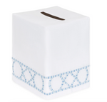 Introducing the Bamboozle Bath Collection by Haute Home: a premium linen tissue box cover in white, adorned with a blue geometric embroidered border near the base. Photographed against a clean white background, this elegant piece offers a sophisticated accent to any home décor.