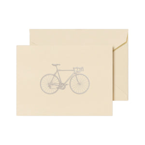 The Crane Racing Bike Note Card Set features a beige folded card with a grey racing bike illustration, paired with a matching envelope—ideal for thank you notes.