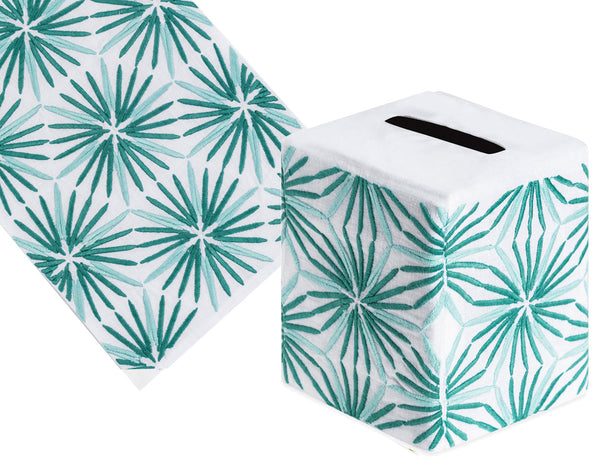 The Haute Home Radiant Bath Collection, Aqua features a hand-embroidered Italian linen tissue box cover with a green leaf design on a white background, perfectly blending elegance and nature.