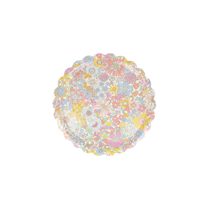 The Meri Meri Rainbow Garden Tray is a round decorative serving tray with scalloped edges, adorned with a pastel floral pattern on a white background.
