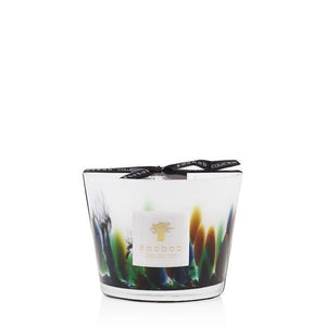 Baobab Collection Rainforest Amazonia Candle by Baobab in a multicolored glass container that features vibrant green and turquoise hues, with a white background.