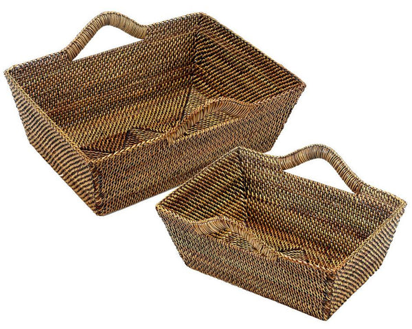 Two baskets from the Calaisio Rectangular Basket Collection, featuring one larger than the other and both equipped with handles, are displayed side by side against a white background. This handwoven collection by Calaisio offers an elegant and functional storage solution for your home.