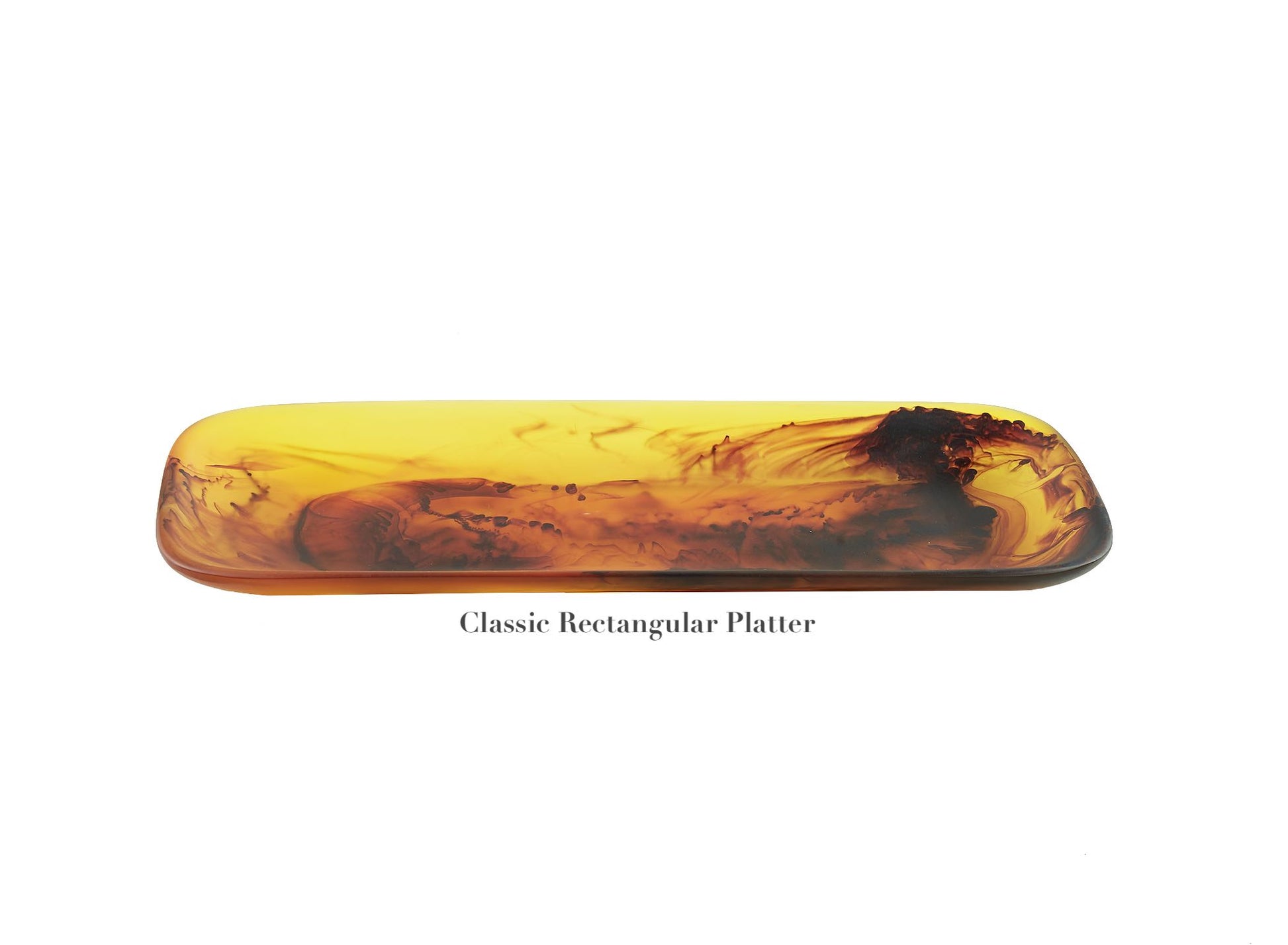 A rectangular amber-hued platter with abstract brown swirls from the Tortoise Resin Serveware Collection by Nashi Home—ideal for stylish home decor.