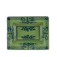 The Oriente Italiano Malachite Dinnerware & Decor Collection by Ginori 1735 features a green ceramic plate with dark blue floral and geometric patterns—an elegant choice for enhancing any floral dinnerware collection.
