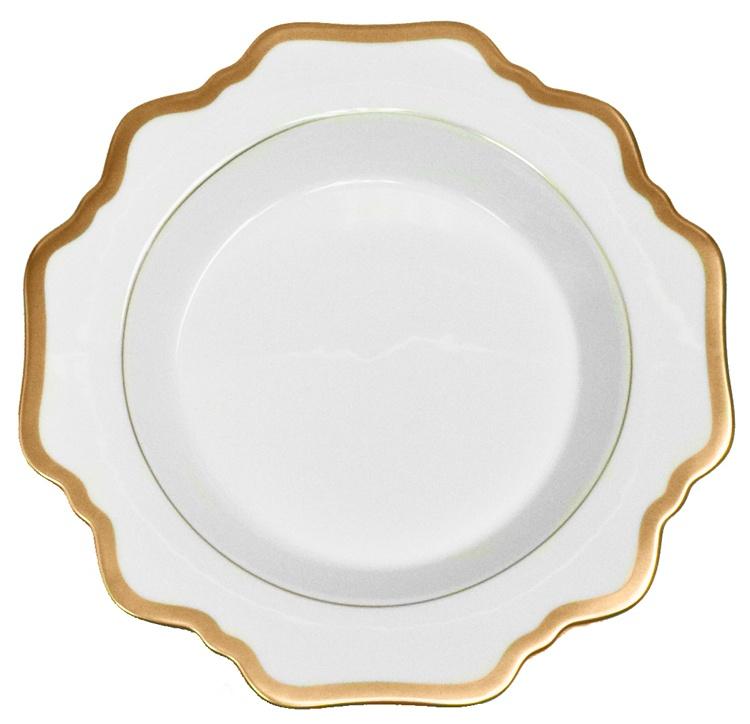Anna’s Palette Antique White with Gold Dinnerware Collection by Anna Weatherley features a white porcelain plate with a scalloped edge, adorned with a gold rim and border trim. Reminiscent of classic hand-painted dinnerware from Budapest, this plate is shown empty against a plain background.