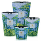 Four Baobab Collection Sacred Trees Summer Yarani candles of different sizes are adorned with vibrant green jungle designs and a "Baobab" label, evoking the mystical baobab forest.