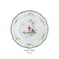 From the Raynaud Longjiang Dinnerware Collection: Salad Plate No. 6 features a scalloped green rim and Vieux Marseille-inspired central art of a traditionally dressed figure amid birds, foliage, and a tree.
