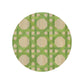 The Epoch Versailles Collection by HestiaLiving features a round mat with interlaced green and beige lattice on white, evoking woven caning—ideal for al fresco dining or holiday entertaining.