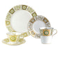 The Royal Crown Derby Panel Green Dinnerware Collection features four fine bone china pieces—two plates, a teacup with saucer, and a mug—adorned with elegant gold and green floral patterns, reflecting timeless British artistry.