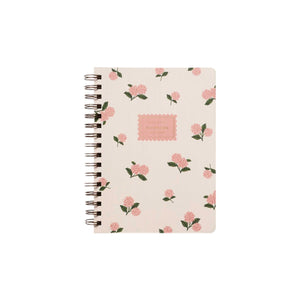 The Pink Hydrangea Collection spiral-bound notebook by Rifle Paper Co. features a cream cover with pink hydrangeas and green leaves, plus a central "NOTEBOOK" label—ideal for anyone who loves elegant paper goods.