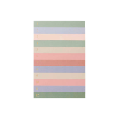 The Rifle Paper Co. Muted Numbered Color Block Memo Notepad features twelve pastel stripes in green, pink, purple, and peach—perfect for organizing daily to-dos on easy-to-tear sheets.
