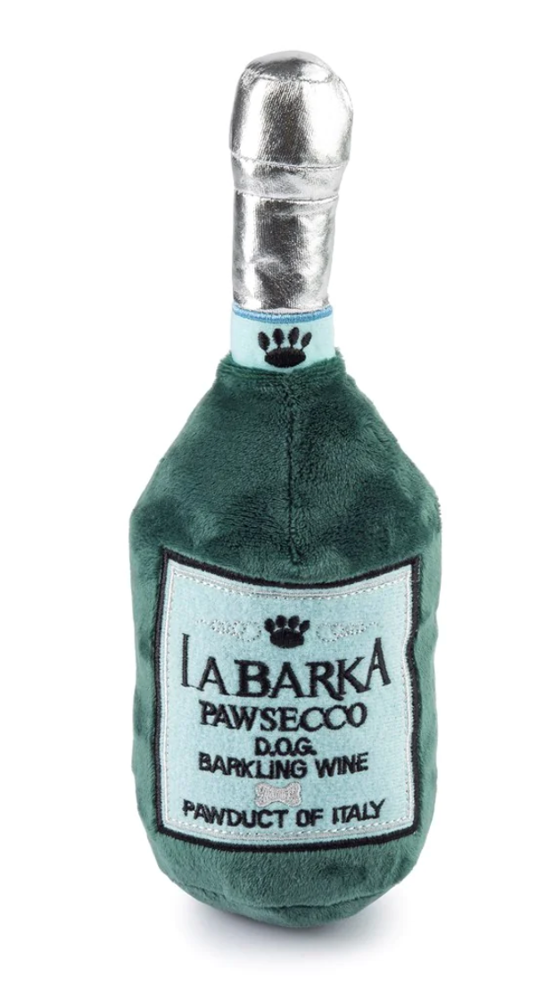 The LaBarka Pawsecco Dog Toy by Haute Diggity Dog is a plush squeaky bottle toy shaped like wine, featuring a playful "LaBarka Pawsecco D.O.G Barkling Wine Pawduct of Italy" label.