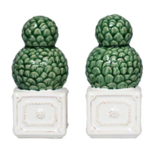 The Juliska Berry & Thread Topiary Salt and Pepper Set features two ceramic shakers shaped like green topiary bushes on white square bases, inspired by formal garden ornaments.