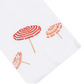 Haute Home Beach Umbrella Bath Collection towel featuring three embroidered beach umbrellas in red and pink tones, viewed from above at an angle with a white tip.