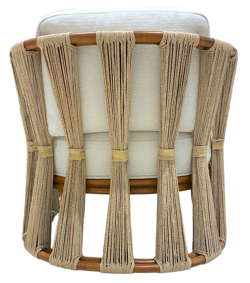 The Strings Attached Lounge Chair by PALECEK features a white upholstered seat and vertical beige rope backrest, elegantly set on a natural-finish wooden frame. Available at Wits End.