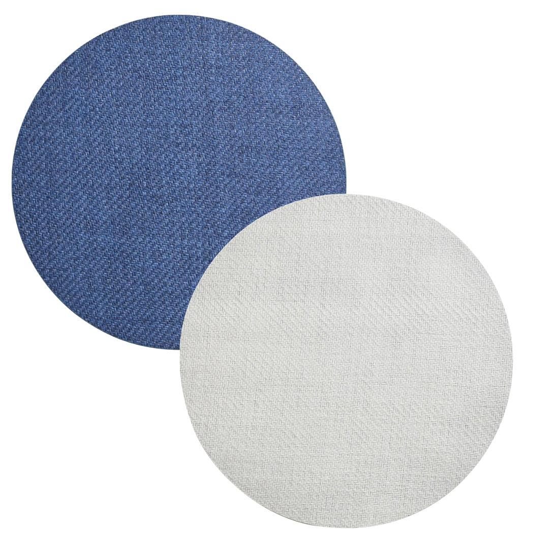Two overlapping Saigon Placemats by Kim Seybert, one in blue and one in light gray, with a textured, woven design reminiscent of Vietnamese plaiting, displayed on a white background.