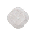 From above, the Le Panier Mystic Knot Collection by Juliska features a neatly coiled white rope tied in an intricate, decorative knot against a white background.
