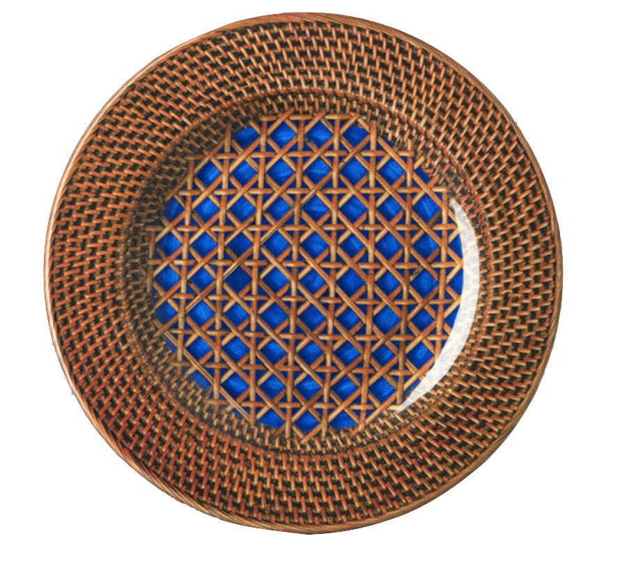 The Patagonia Blue Melamine Dinnerware Collection by Mario Luca Giusti features a round plate with a woven rattan-patterned rim and geometric blue-brown lattice center, blending antique charm with modern style.