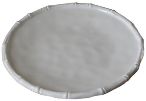 The Beatriz Ball Vida White Bamboo Dinnerware Collection features a round, white luxury melamine plate with a bamboo-like pattern and a slightly raised rim, blending elegance with break-resistant durability.