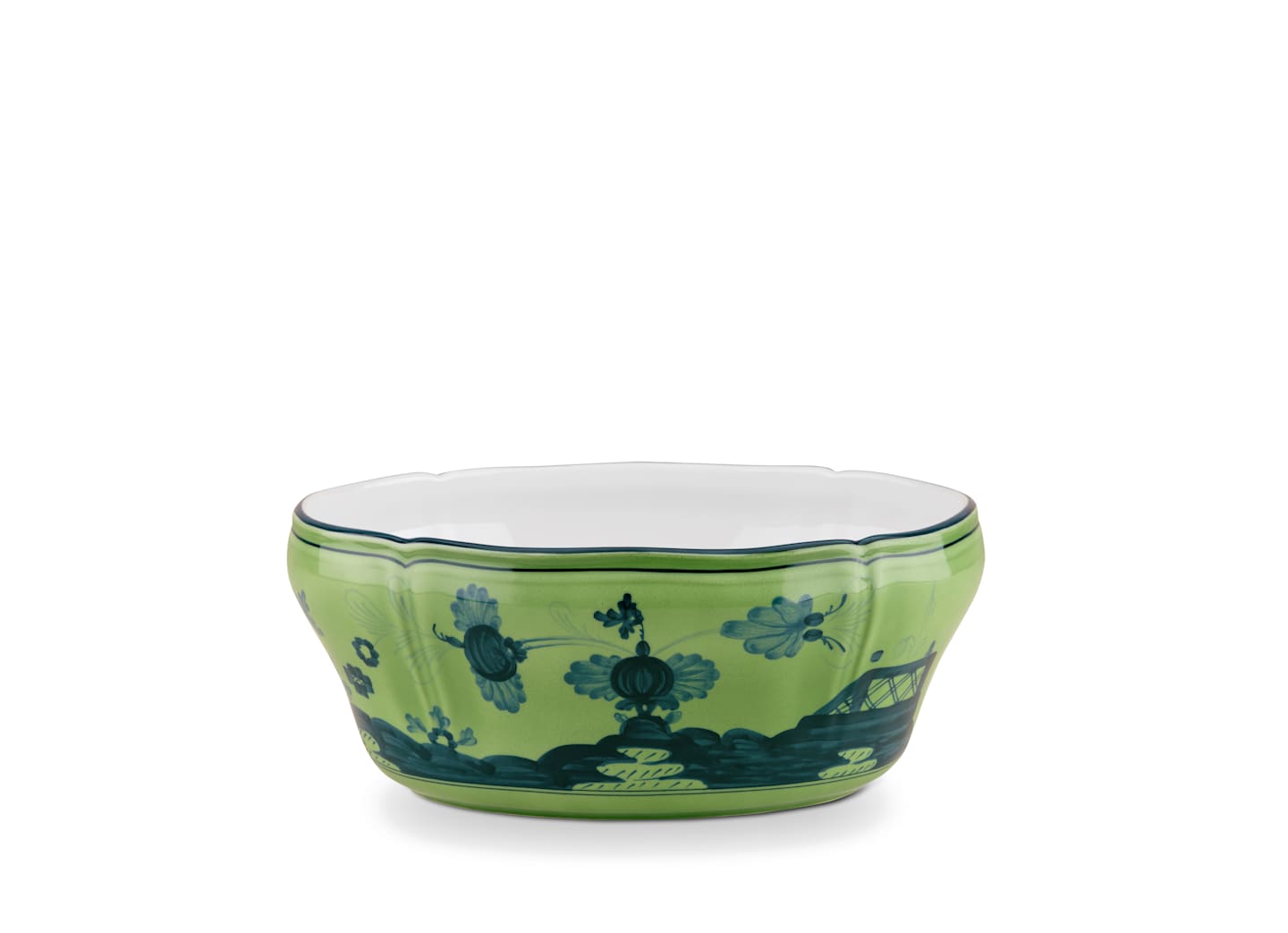 A green ceramic bowl with a scalloped rim from the Ginori 1735 Oriente Italiano Malachite Collection, featuring blue floral and landscape motifs inspired by exotic Ginori ceramics.