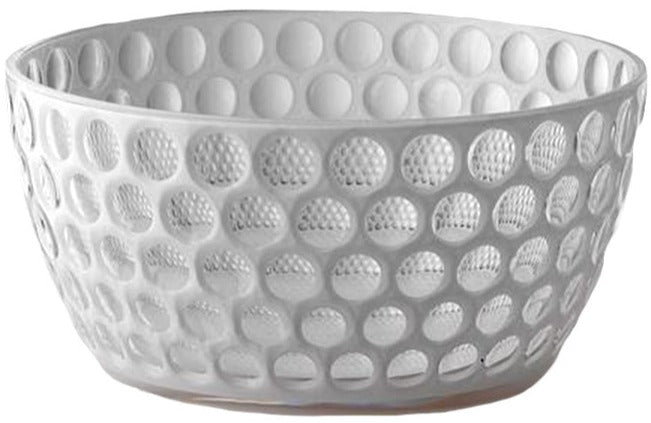 The Lente Acrylic Dinnerware Collection by Mario Luca Giusti features a white bowl with raised circular bumps, ideal for outdoor entertaining and pairing well with blue acrylic pieces.