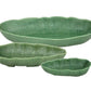 Three green, leaf-shaped ceramic serving bowls with ribbed texture and small handles from HIVE’s Banana Leaves Salad Bowl Collection, handmade and displayed against a white background.