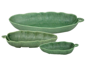 Three green, leaf-shaped ceramic serving bowls with ribbed texture and small handles from HIVE’s Banana Leaves Salad Bowl Collection, handmade and displayed against a white background.