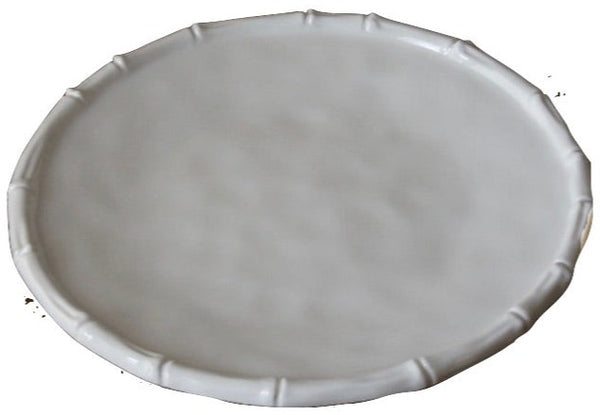 A Beatriz Ball Vida White Bamboo Salad Plate viewed from above against a neutral background.